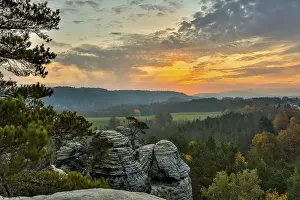 Category Mountain Landscapes Prints: Sunrise in the mountains with a rocky peak in the foreground