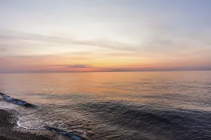 Sunrise over the sea, behind Anafi island