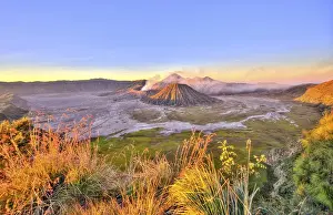 Sunrise, smoking volcano Mount Bromo, Mt