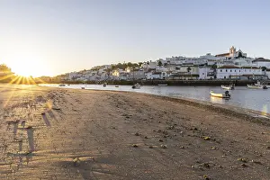 Category Historic EN Prints: Sunrise with view over a beach and harbour basin at low tide