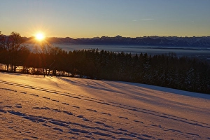 Sunrise in winter, view from Hohenpeissenberg with Ammergau Alps