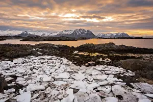 Sunset on the coast of Laukvik in winter