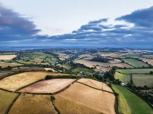 Sunset of Fields and Farms over Devon from a drone