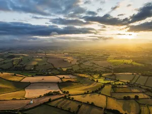 Sunset of Fields and Farms over Devon from a drone