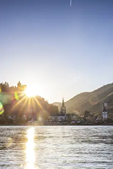 Sunset over the hills by the river