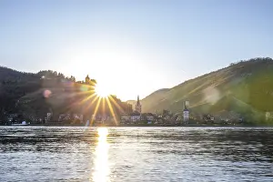 Sunset over the hills by the river