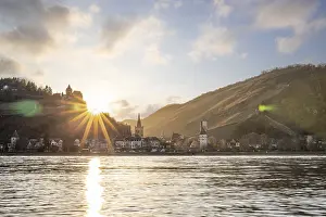 Sunset over the hills by the river