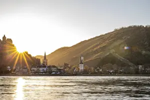 Sunset over the hills by the river