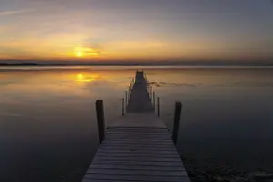 Category Scandinavia Prints: Sunset on a jetty in the Limfjord near Hvalpsund