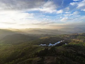 Sunset over Mountains and Coniston Water from drone