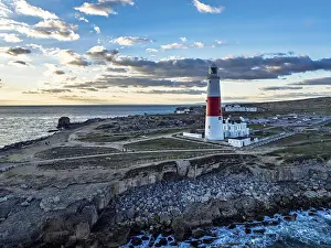 Sunset over Portland Bill Lighthouse from a drone