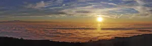 Sunset in a sea of fog over Lake Constance