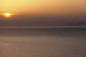 Sunset over the sea near Santorini