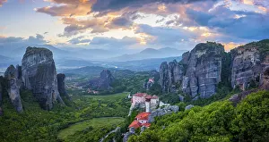 Sunset sky and monastery of Rousanou and Monastery of St