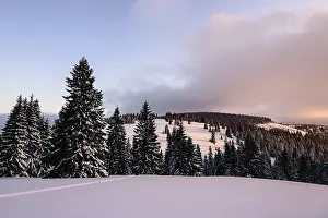 Sunset on the snow plain in the Smrekovica mountains in Velka Fatra