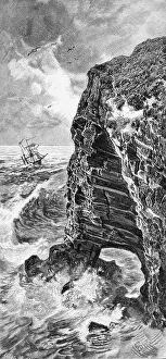 Surf on the red sandstone cliff face