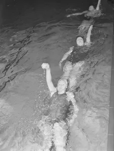 Swimming practice in the 1940s. Three young women are practising backstroke swimming. March 1940 Sweden Photo Kristoffersson ref 83-2