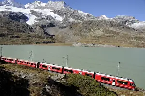 Swiss Alps: Train trip over Bernina Pass and Lake Bianco | Railway journey over the Bernina Pass past Lake Bianco