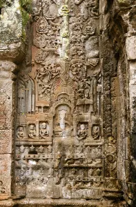 Ta Prohm was built in the Bayon style largely in the late 12th and early 13th centuries