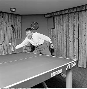 Framed Print : Table Tennis 1967. Singer Thore Skogman (1931-2007) pictured playing table tennis in the basement room of his house Framed Print : Table Tennis 1967. Singer Thore Skogman (1931-2007) pictured playing table tennis in the basement room of his house