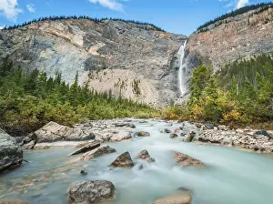 Takakkaw Falls, waterfall on rock face and river