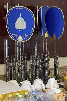 Several talipot fans with symbolic painting at Buddhist temple Asokaram