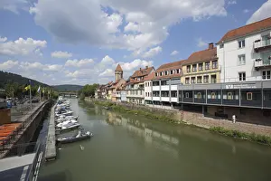 Tauber riverbank with landing stage for boats