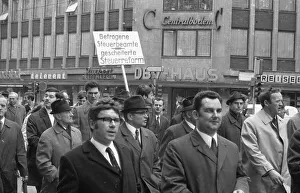 Tax officials also take to the streets for their demand for more pay