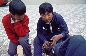 Teenager, young shoe cleaner at work