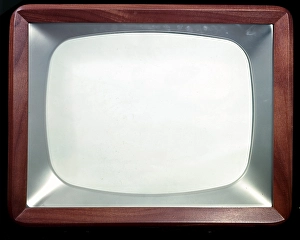 Television in the 1950s. A typical tv furniture in a wooden casing with a small tv-screen