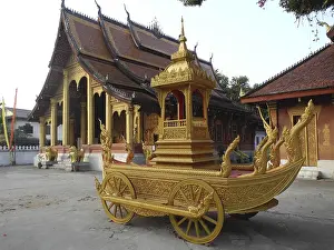 Temple and ritual carriage, in Luang Prabang