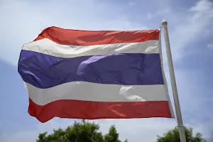 Thai flag in front of the Grand Palace