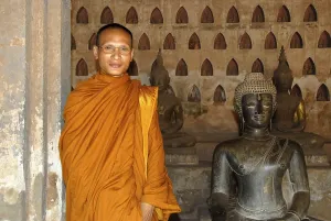 Theravada Buddhism, monk dressed in orange robes