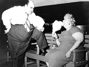 Thick couple eating cotton candy, ca