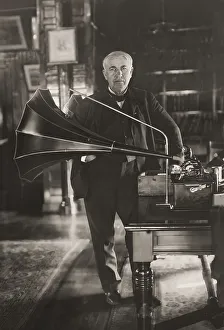 Thomas Alva Edison with his cylinder phonograph