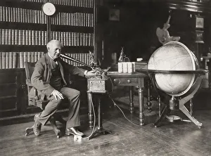 Thomas Alva Edison talking into the business phonograph or ediphone