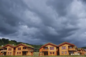 Thunderclouds over a holiday-home area