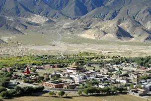 Tibetan Buddhism, monastery complex in the form of a Mandala below a mountain slope