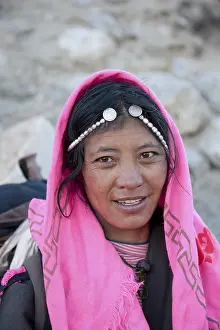 Tibetan Buddhism, portrait, pilgrim wearing a pink headscarf