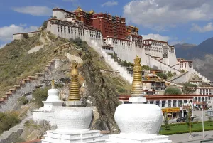 Tibetan Buddhism, white stupas in front of the Potala Palace