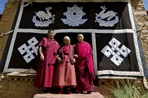 Three Tibetan Buddhist nuns, a younger