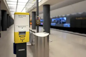 Ticket and ticket machine at a Berlin underground station