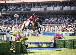 Category Historic EN Prints: Tiffany Foster of Canada and riding Figor compete in the first round of the 1