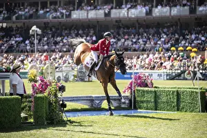 Category Historic EN Prints: Tiffany Foster of Canada and riding Figor compete in the first round of the 1
