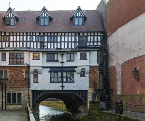 Timber framed buildings on historic High Bridge over River Witham