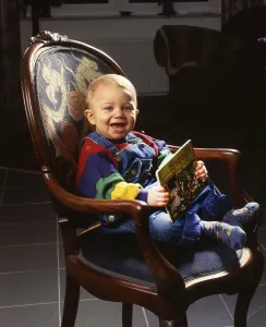 Toddler playing with building blocks