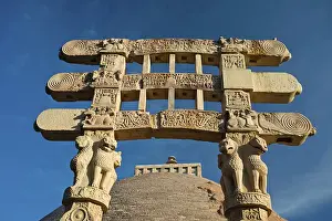 Category Buddhism Prints: Toran or sacred gateway with stone reliefs at the Buddhist stupa