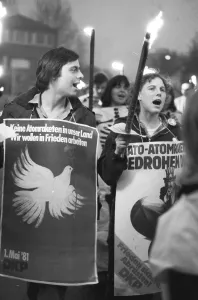 A torchlight procession for disarmament and against nuclear missiles moved to the Ministry of Defence at Hardthoehe