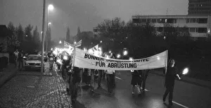 A torchlight procession for disarmament and against nuclear missiles moved to the Ministry of Defence at Hardthoehe