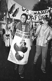A torchlight procession for disarmament and against nuclear missiles moved to the Ministry of Defence at Hardthoehe